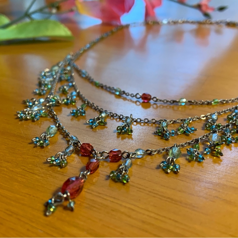 Bib-style necklace with dangling glass beads in green, blue and red, 20 inches